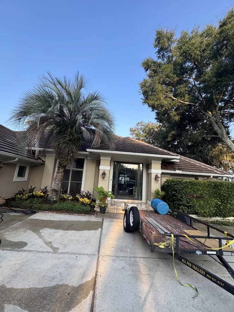Wide view of a Jacksonville home with a tile roof ready for professional soft-washing